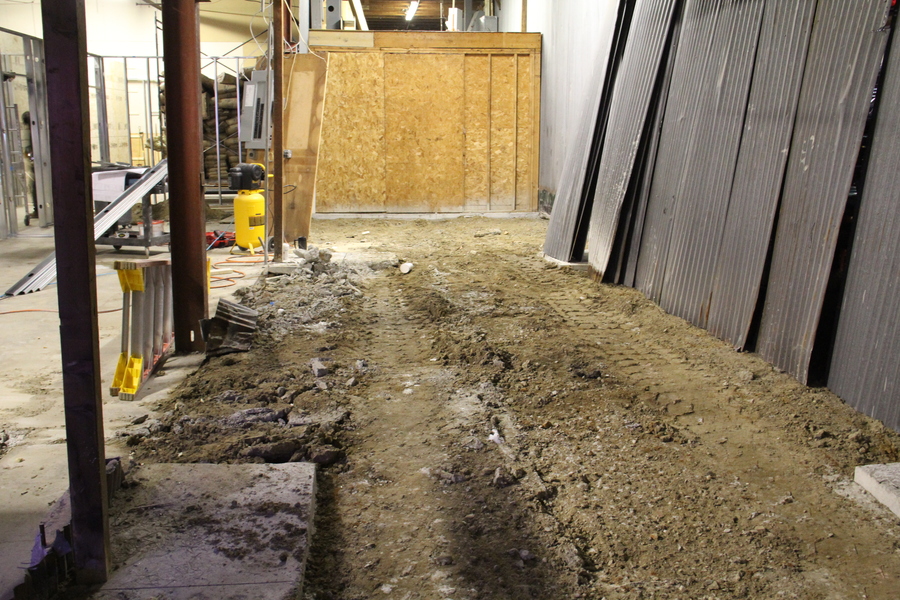 Most of the floor issue has been solved. This area used to be 8 inches higher than the rest of the space.